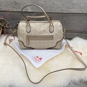 Coach cream and tan crossbody purse, purple lining